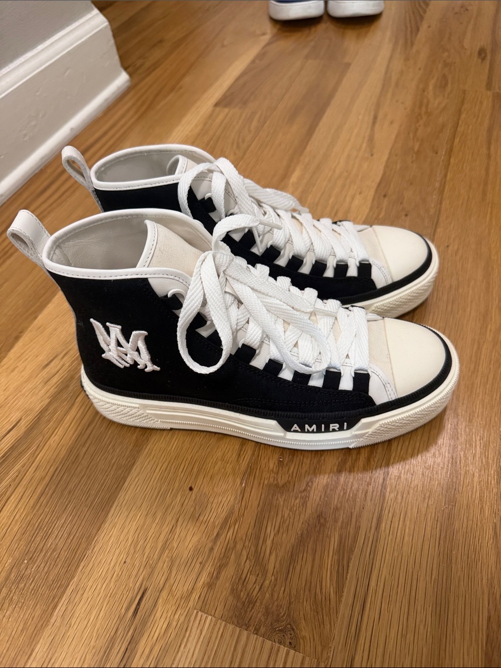 AMIRI Black and White High-Top Sneakers with Contrast Logo